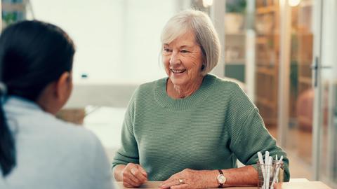Counselor meeting with a patient in an office setting