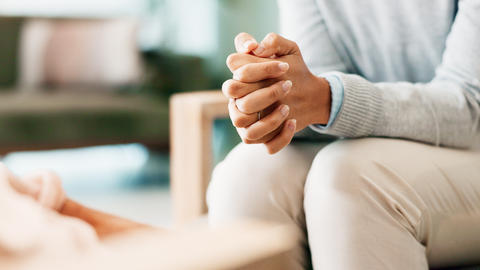 Counselor meeting with a patient in an office setting