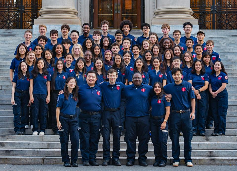 The entire CrimsonEMS team standing together in front of Widener Library in Harvard Yard.